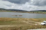 Descoperire macabră în râul Olt: trupul unei tinere, găsit într-o valiză la Ionești